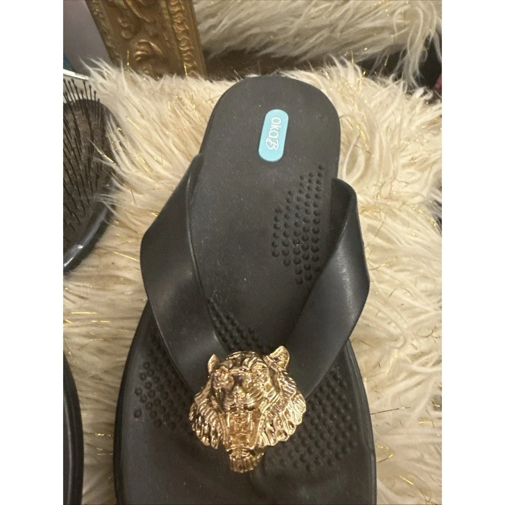 New Okab Black Licorice Gold Lion Head Rubber Flip Flop Thong Sandals Womens M/L
